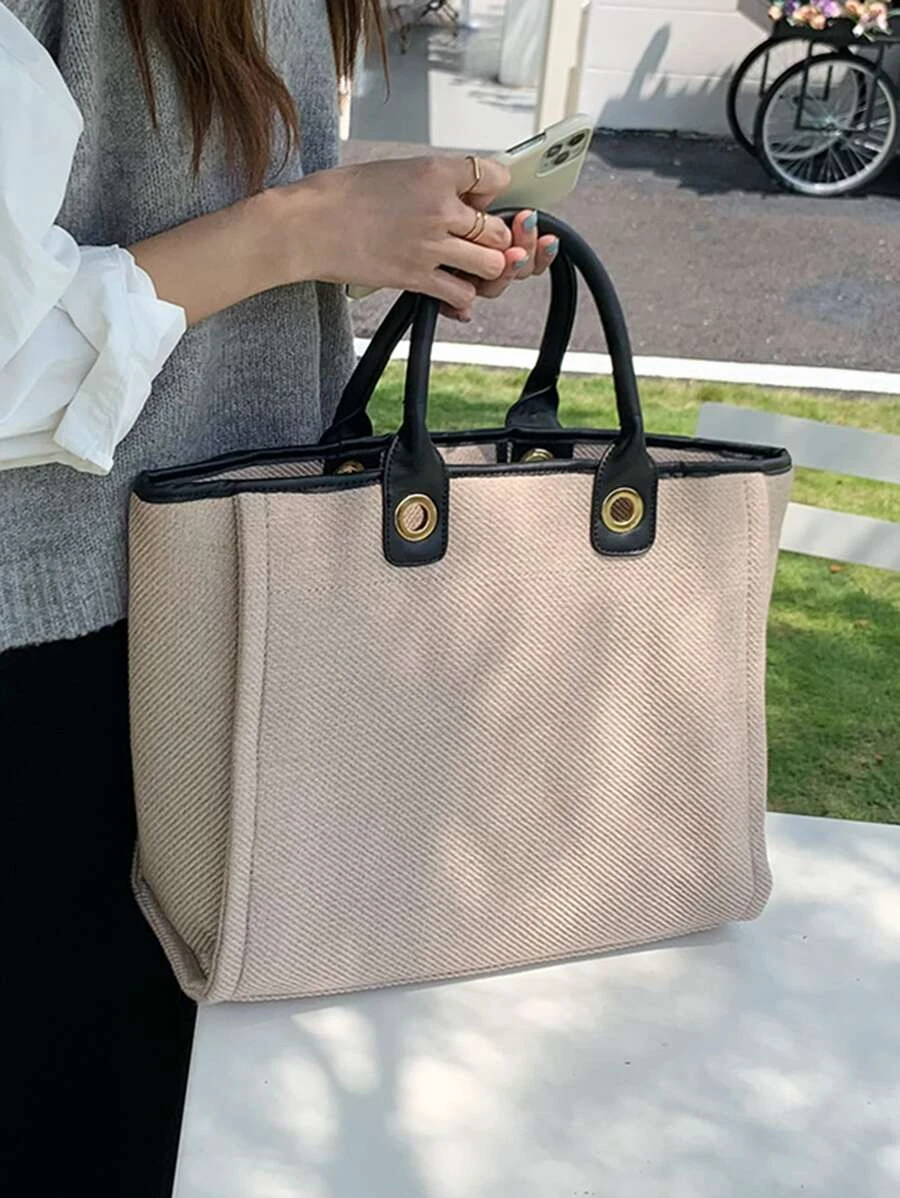 กระเป๋าถือ เย็บสีตัด เสื้อv-16