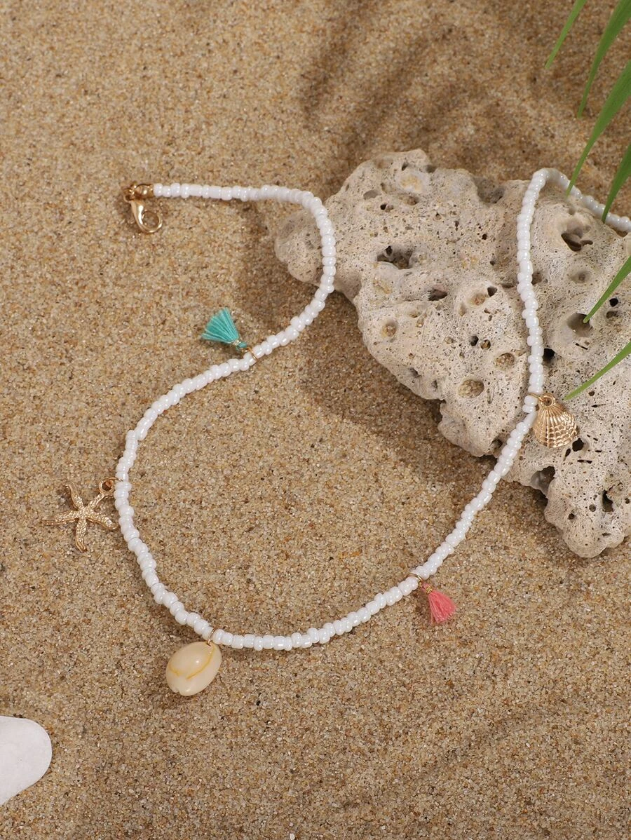 สร้อยคอ ลูกปัด จี้ ปลาดาว & พู่ kk-17